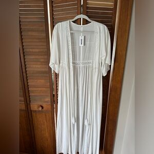 White cover up, tags are still on, never worn